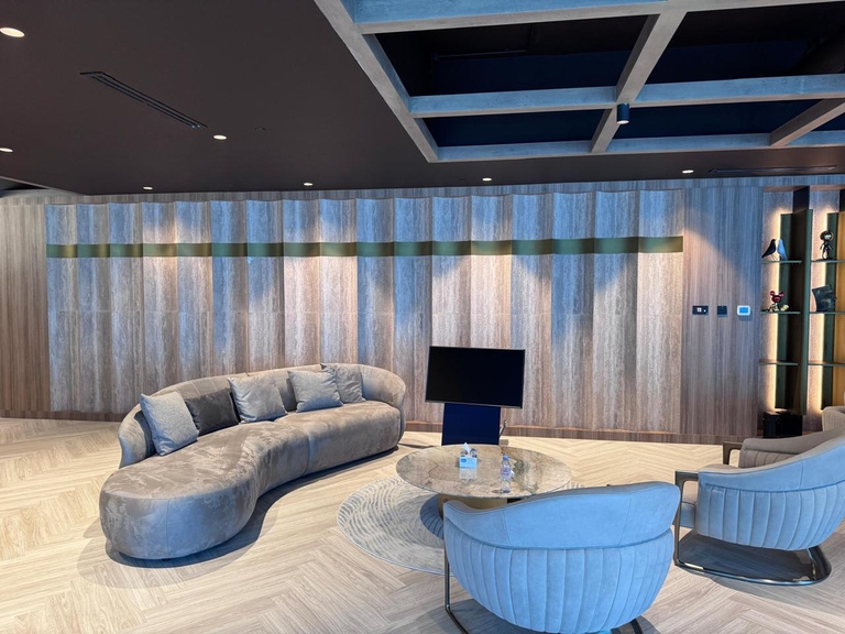 a room with a couch and a television
